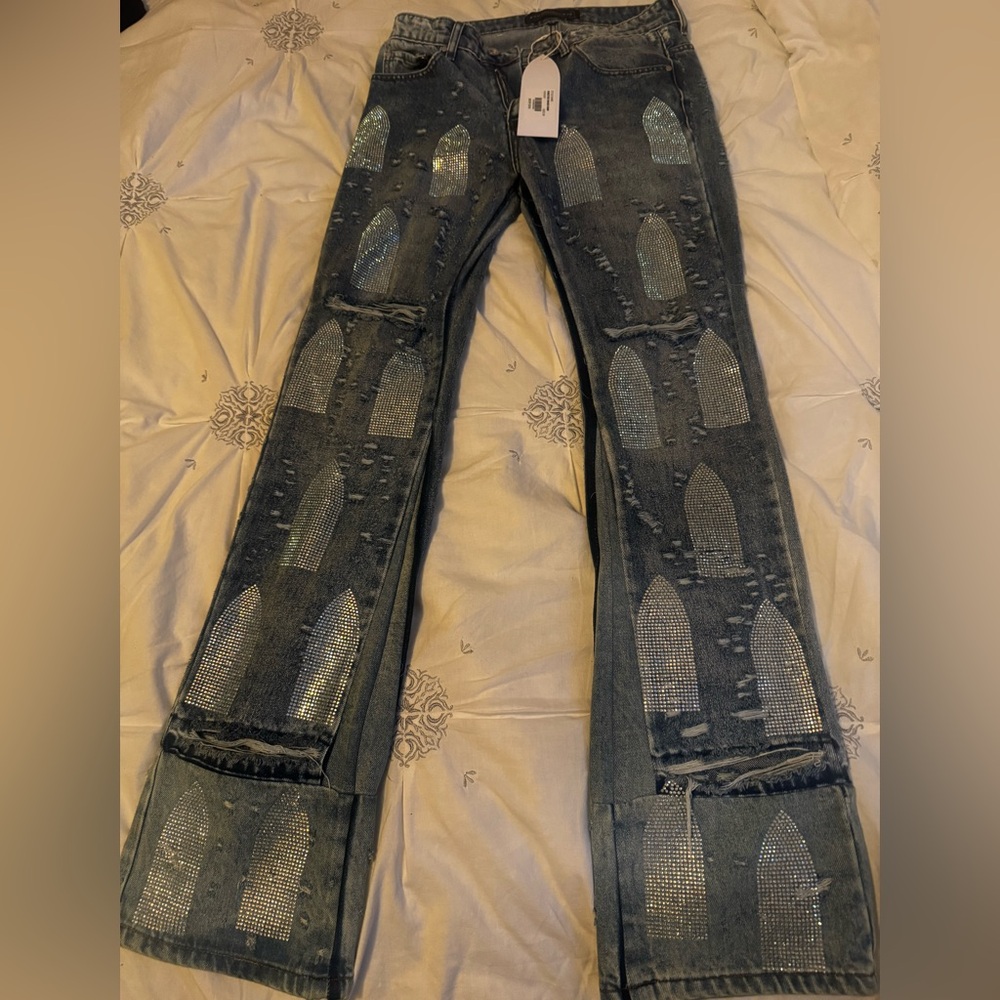 Who decides war rhinestone washed denim jeans